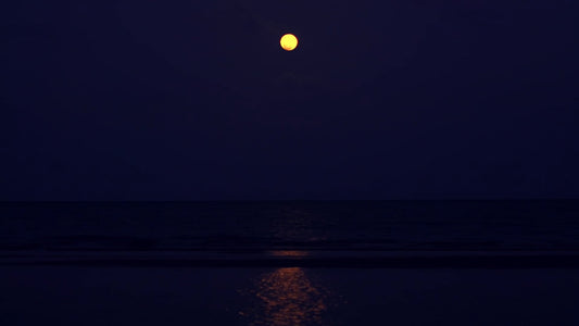 SLEEP - Red Moon over the Ocean and Moonrise in Goa, India